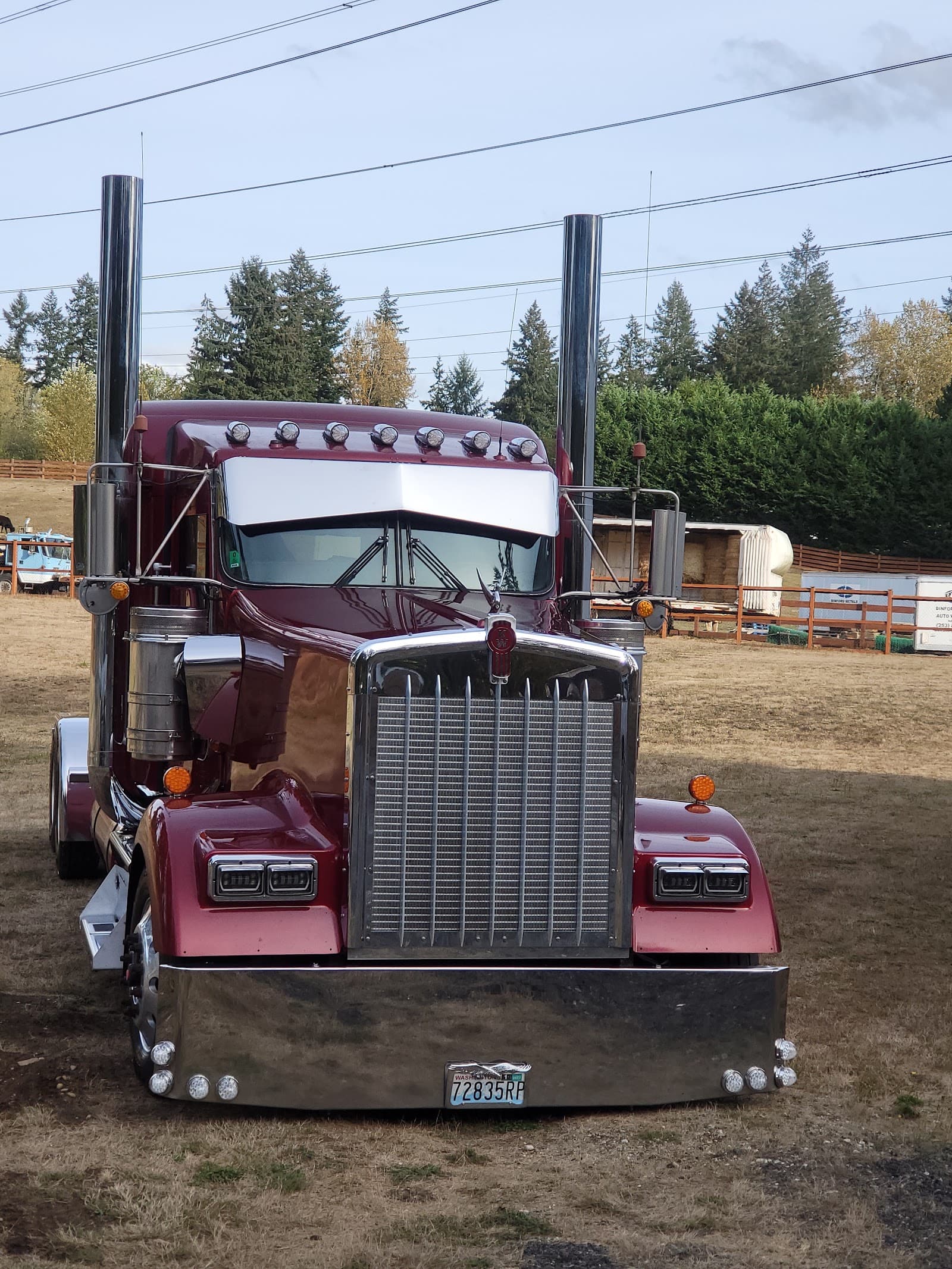 Emerald Express Kenworth W900 with chrome grille and stacks